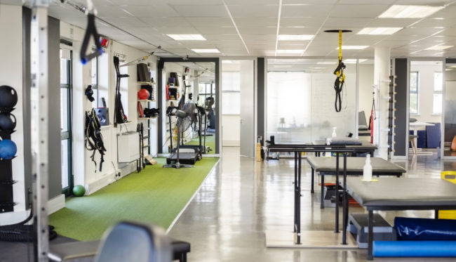 Interior of rehabilitation center with therapeutic equipment physical therapy practice acquisition