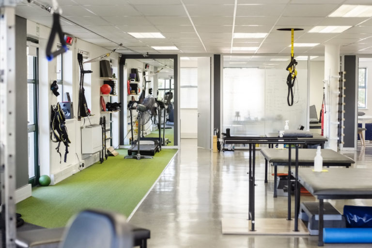 Interior of rehabilitation center with therapeutic equipment physical therapy practice acquisition
